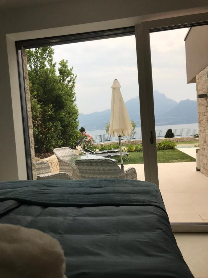 Le Rocce Lägenhet Torri Del Benaco Exteriör bild